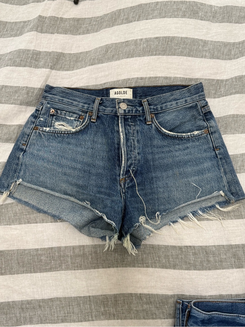 Agolde Medium Blue Distressed Denim Cutoff Shorts